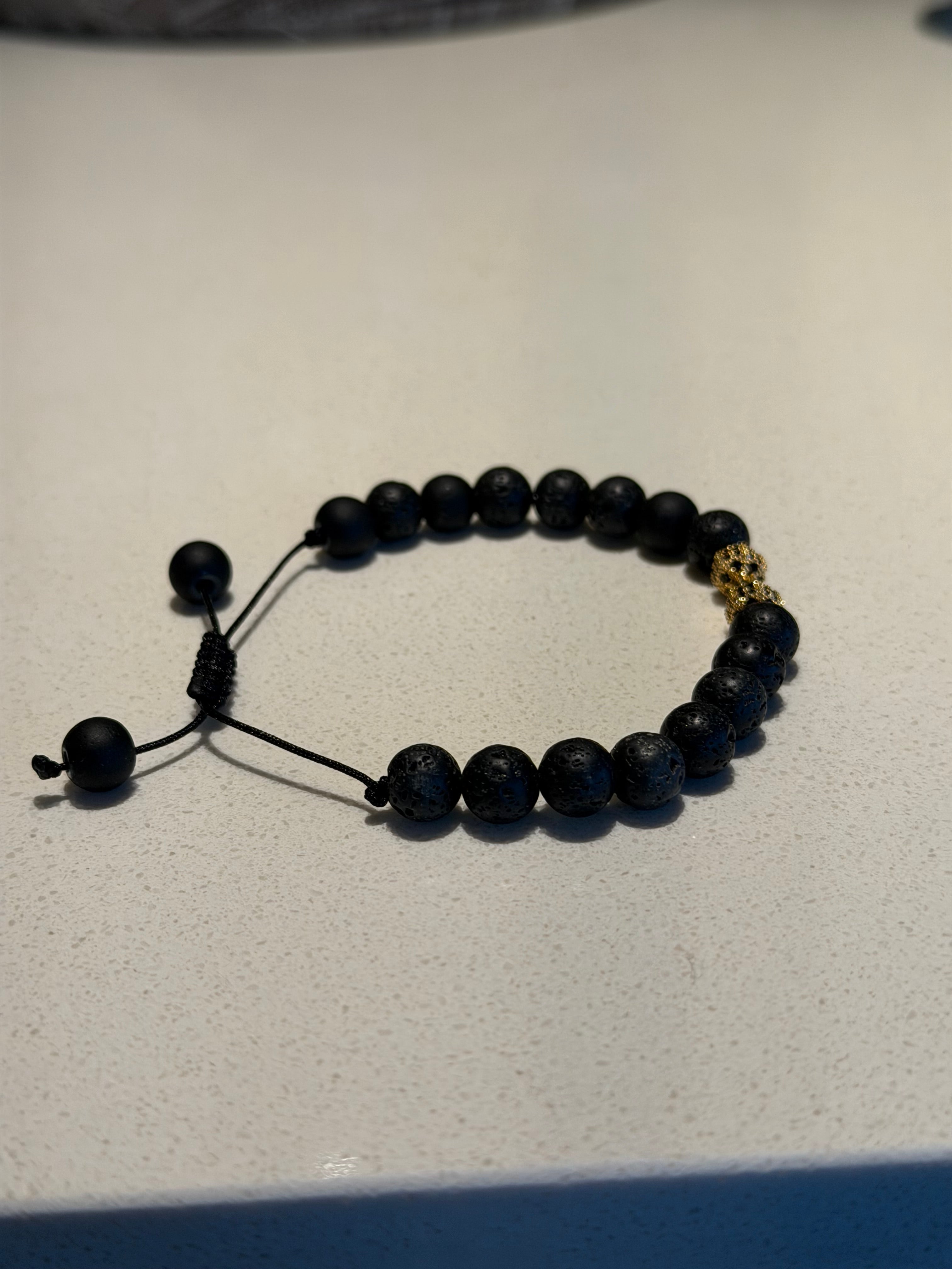 NEGORA black natural stone sliding knot bracelet